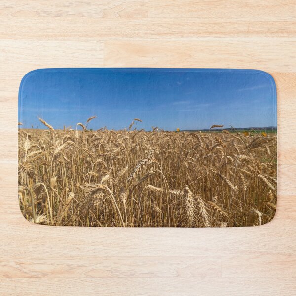 Artikelvorschau, Field of ripe golden wheat against a blue sky with clouds entworfen und verkauft von EG Creativity Art.