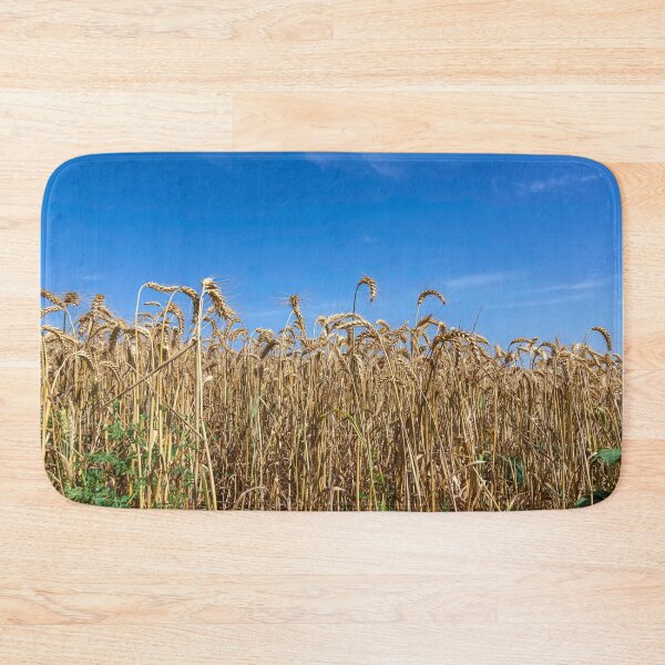 Artikelvorschau, Field of ripe golden wheat against a blue sky with clouds entworfen und verkauft von EG Creativity Art.