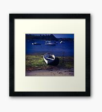 Boats on a lake Framed Print