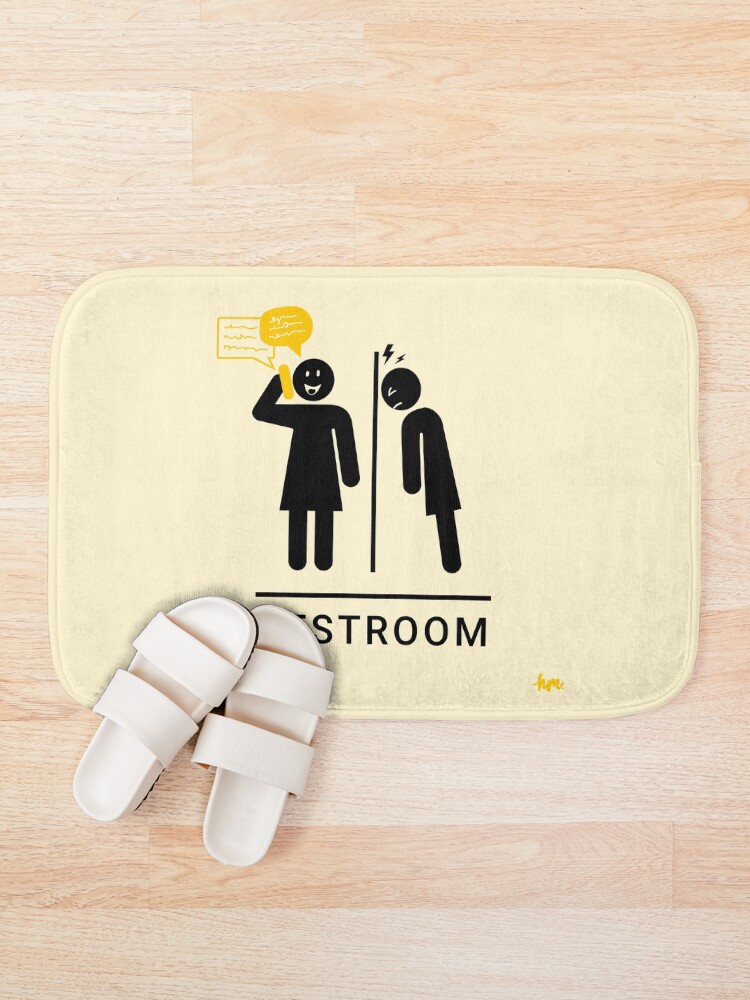 Thumbnail 2 of 6, Bath Mat, Restroom sign with one woman symbol talking on the phone and the other banging her head against the wall designed and sold by Honey Madison.