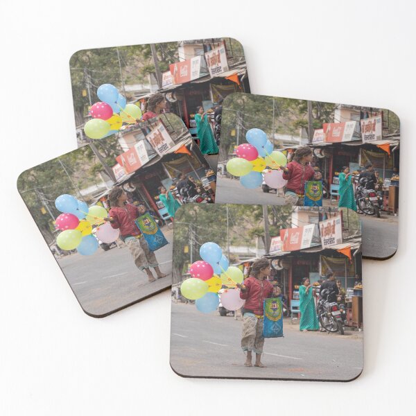 Item preview, Child (girl) begger selling balloons to tourists in the middle of the street in rural india designed and sold by mkopka.