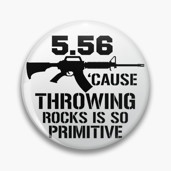 Item preview, 5.56 Cause Throwing Rocks Is So Primitive Funny Gun Gear designed and sold by DynamicDesign.
