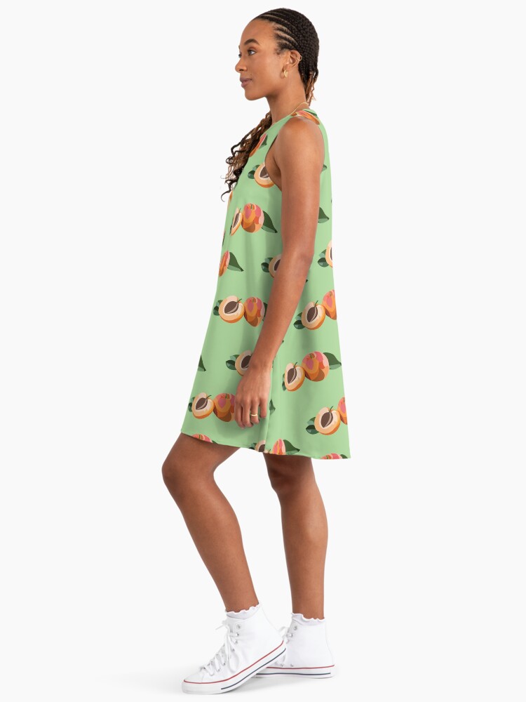 green and peach dress St. John
