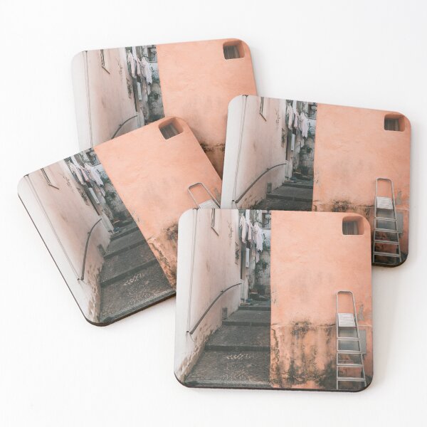Item preview, Ladder against orange wall in the old Italian village Ischia Porto, Italy designed and sold by michieldros.