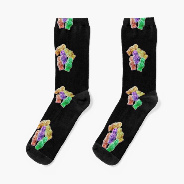 Jelly babies sweets on a black background. Socks