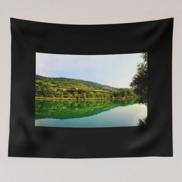 Item preview, Classic panorama with Marche hilly landscape, emerald waters of the lake, tree silhouette and lush vegetation designed and sold by Kristina Drozd.