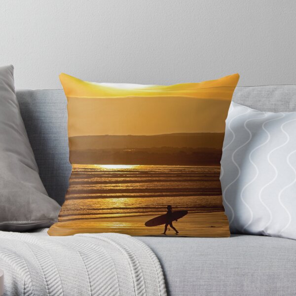 Surf girl walking on beach at sunset Throw Pillow
