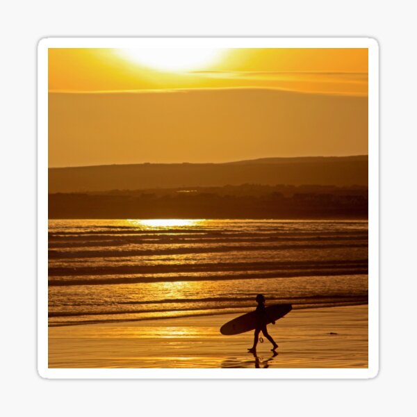 Surf girl walking on beach at sunset Sticker