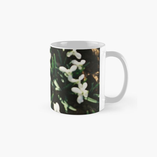 Blurred snowdrops on analogue film Classic Mug