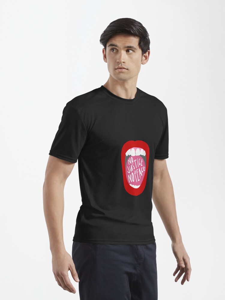 Imagen 3 de 7, Camiseta deportiva con la obra Grita sin justicia no hay paz, diseñada y vendida por anna-ambrister.