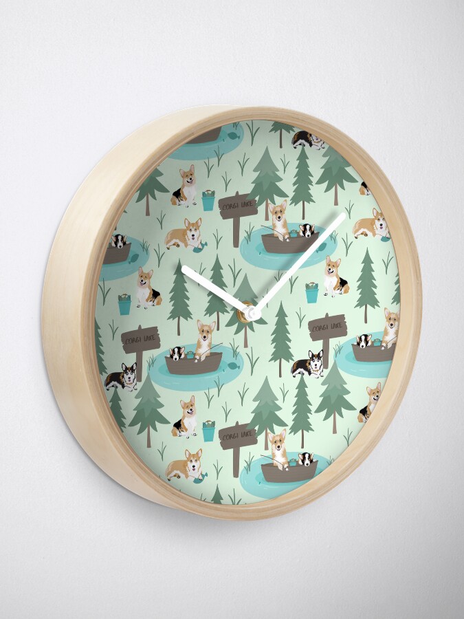 Alternate view of Corgis are fishing in the forest lake Clock