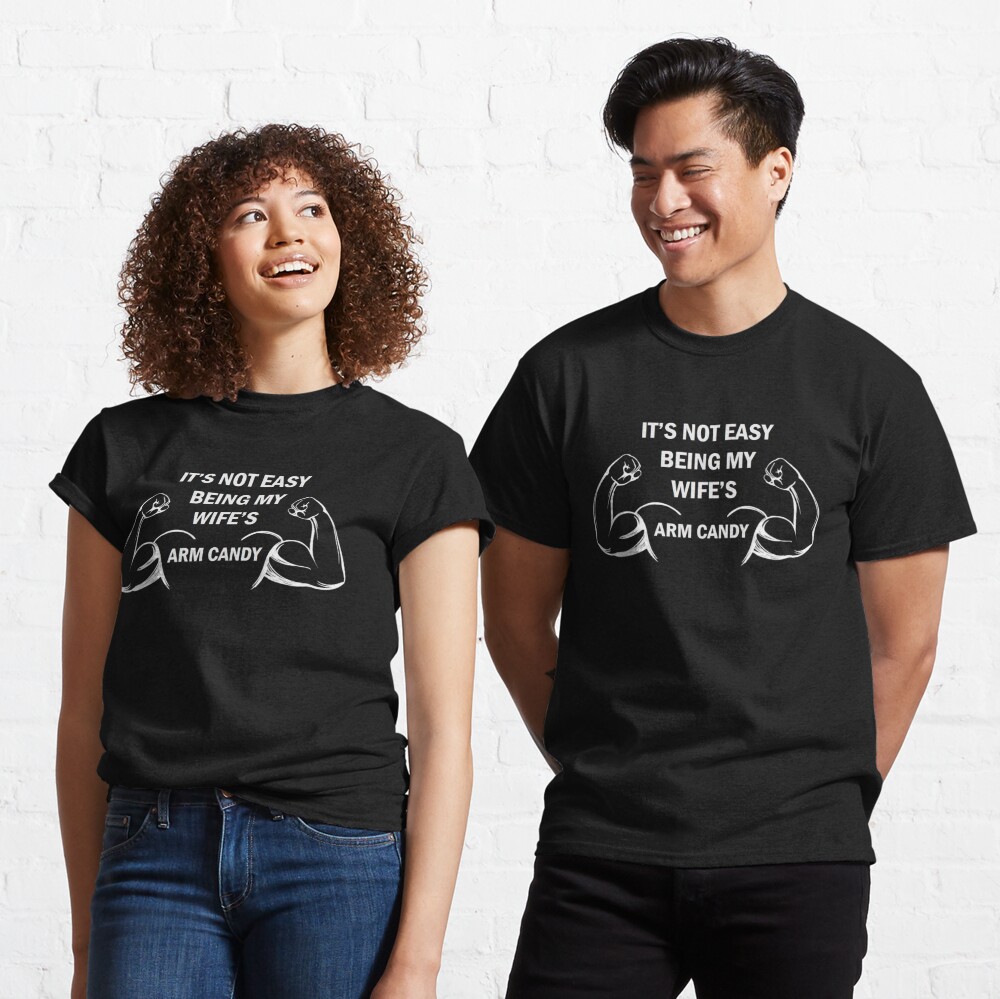 IT'S NOT EASY BEING MY WIFE'S ARM CANDY  Essential T-Shirt by Printes  Digital