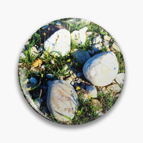 Item preview, Shot from Santarelli lakes in Piane di Moresco with different white stones interspersed with green grass and yellow flowers designed and sold by Kristina Drozd.