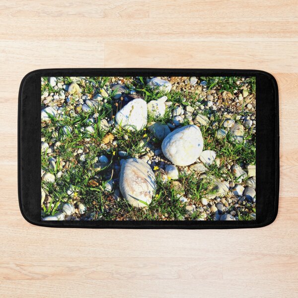 Item preview, Shot from Santarelli lakes in Piane di Moresco with different white stones interspersed with green grass and yellow flowers designed and sold by Kristina Drozd.