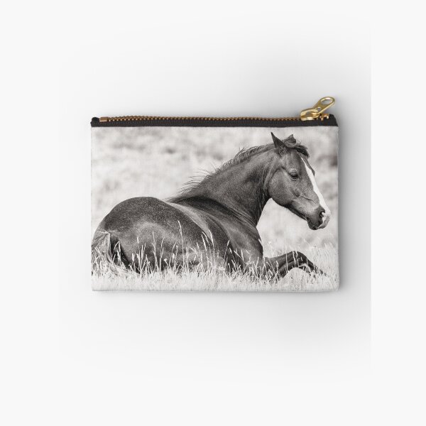 Item preview, Equine Elegance - Black and White Photo of a Horse Relaxing in a Field designed and sold by ChrisWrightPics.