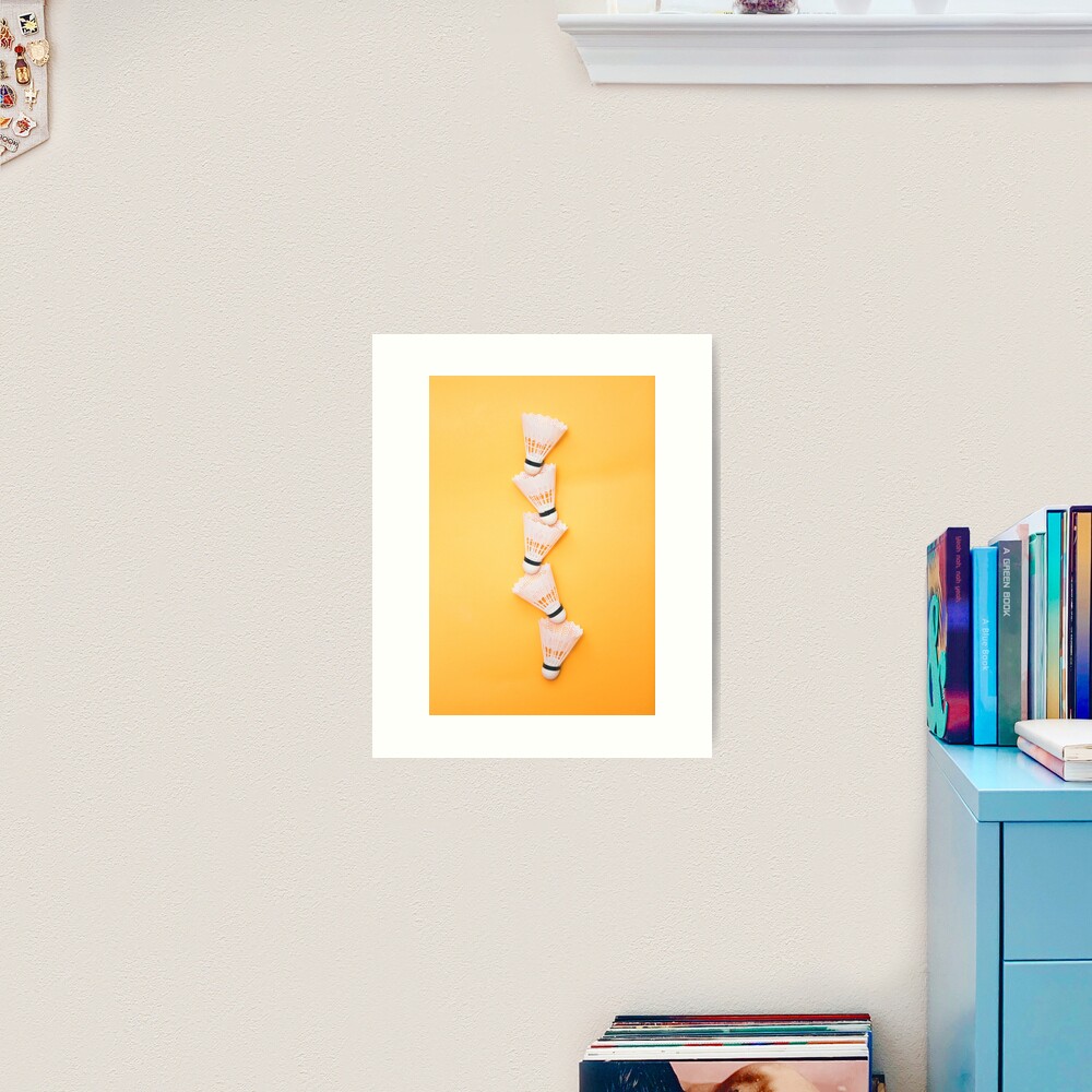 Shuttlecocks on yellow background Art Print