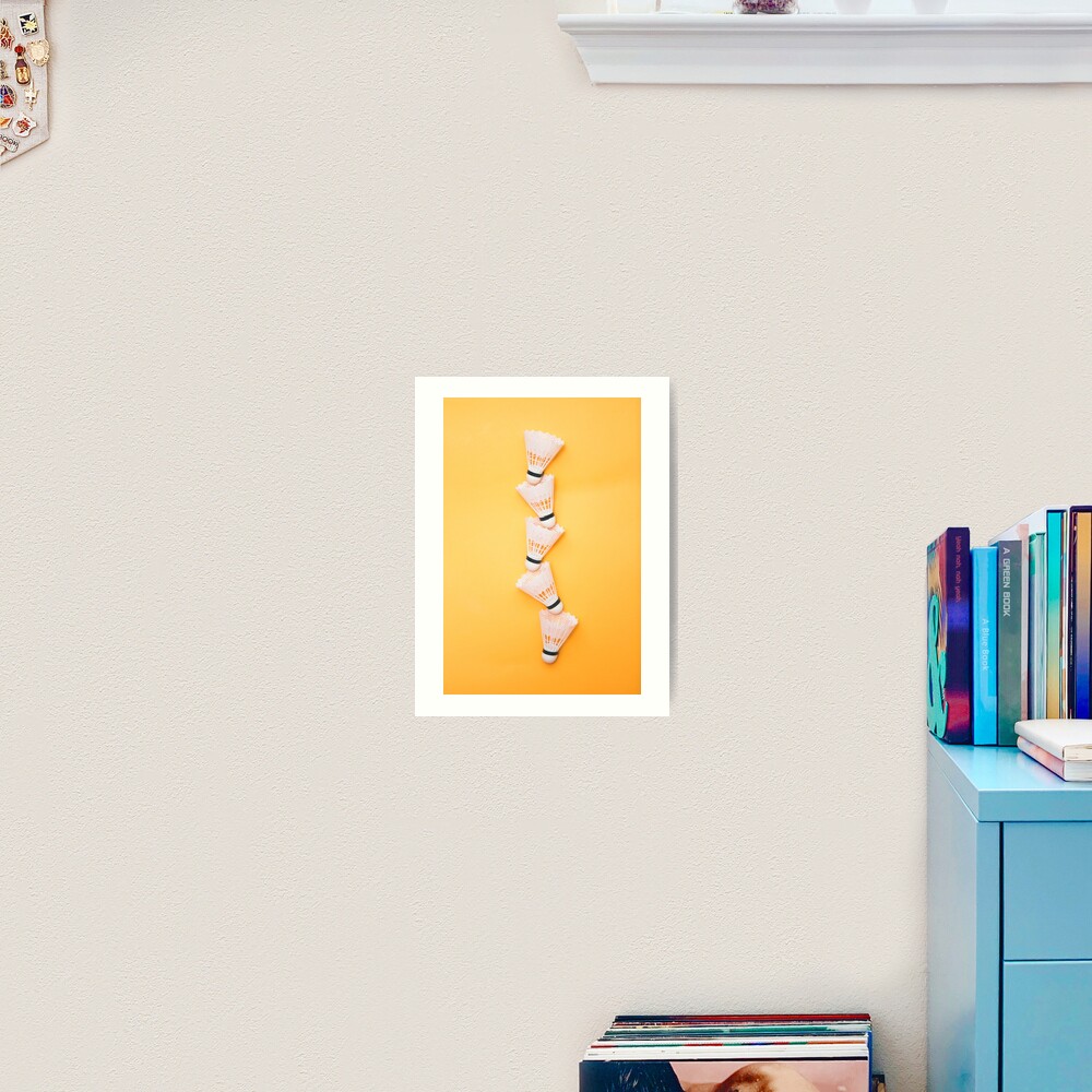 Shuttlecocks on yellow background Art Print