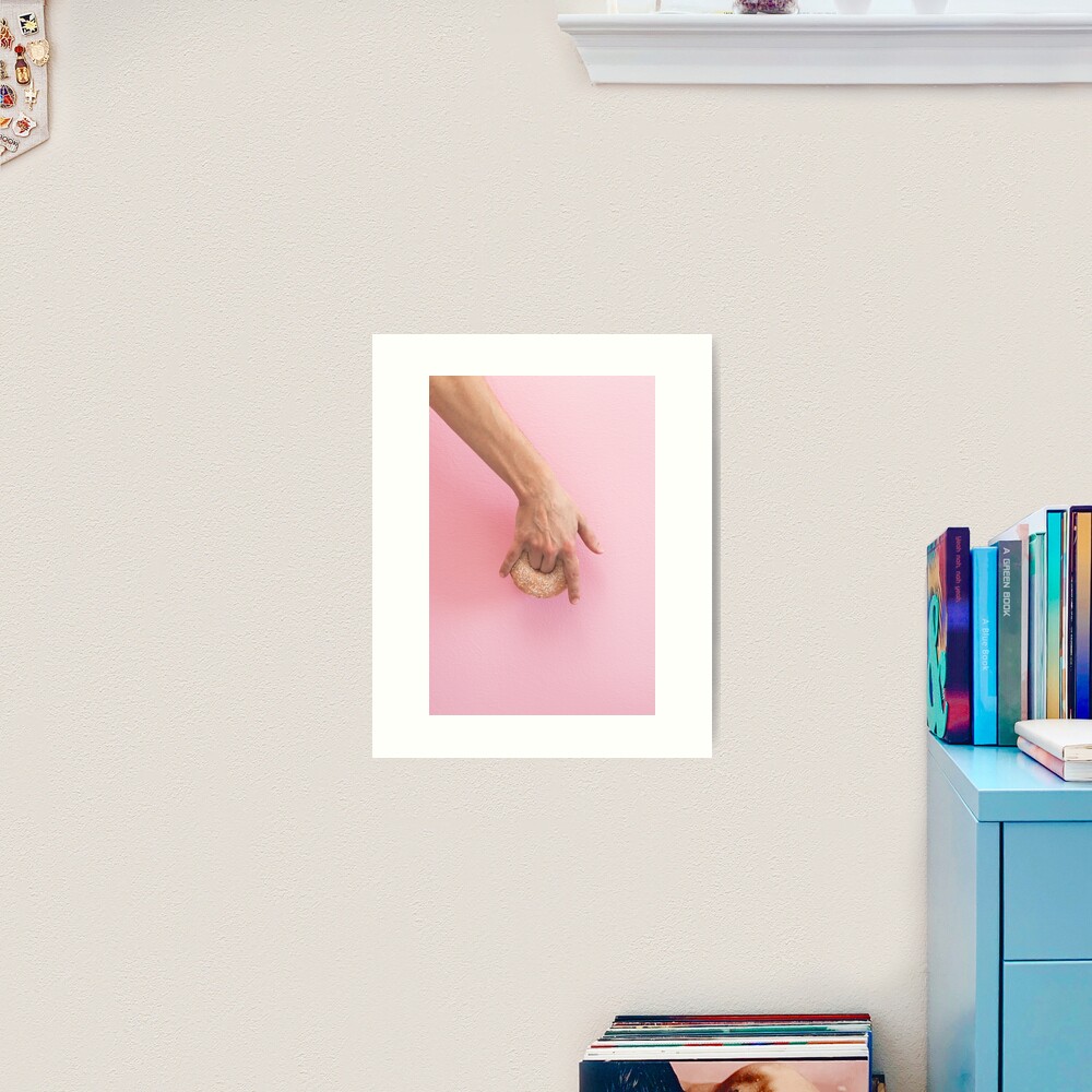 Hand holds donut Art Print