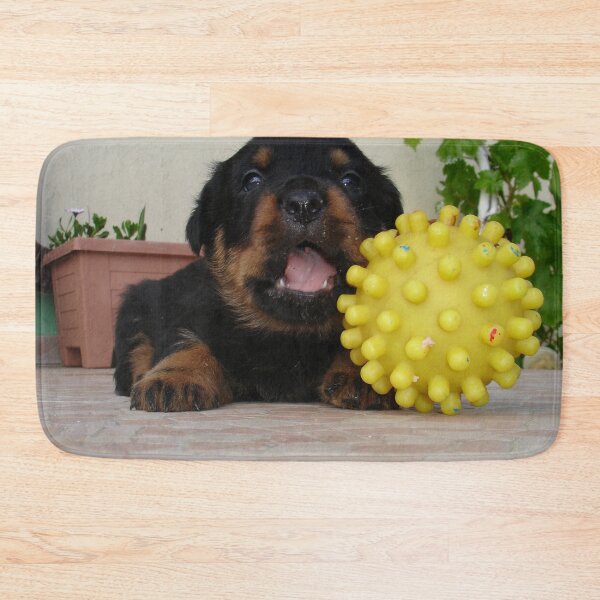 Item preview, Tiny Rottweiler Puppy Playing With Large Toy Ball designed and sold by taiche.
