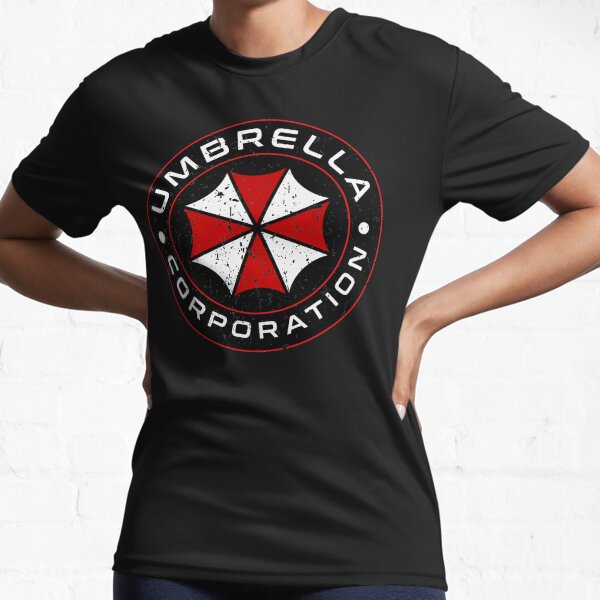 Sie werden sich sicherlich an die Umbrella Corporation erinnern, aus der das gefährliche Virus stammt, das die Menschheit infiziert hat. Genießen Sie diesen Entwurf auf T-Shirts Funktionsshirt