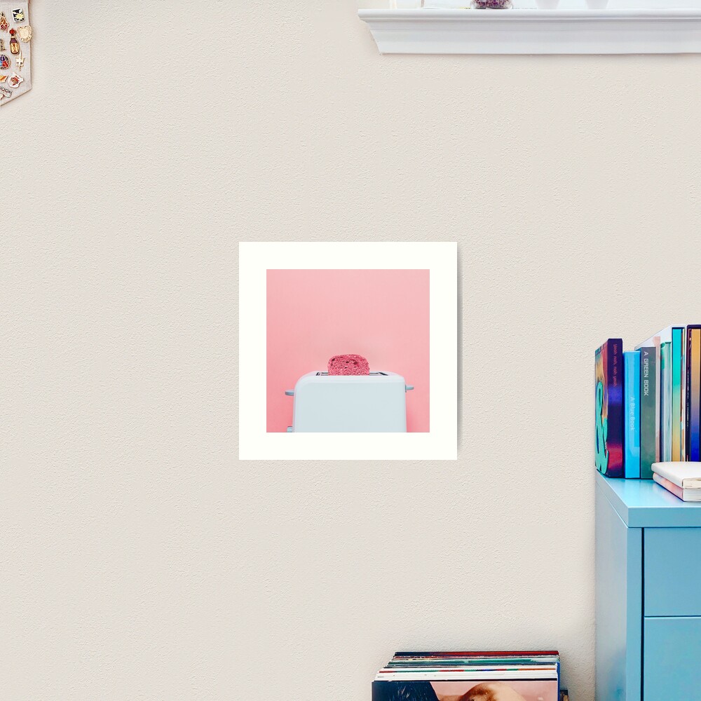 Pink toast in toaster Art Print