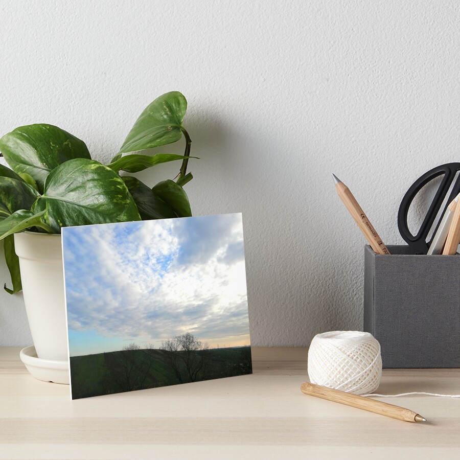 Mountain landscape at sunset, a few fluffy clouds and scattered skies in the sky, wonderful shades of colors Art Board Print