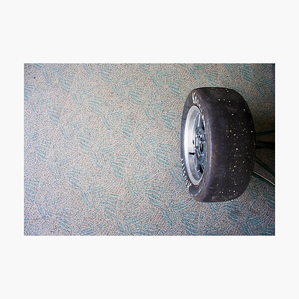 tyre on carpet Photographic Print