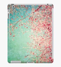 Pink autumn leafs on blue textured background iPad Case/Skin