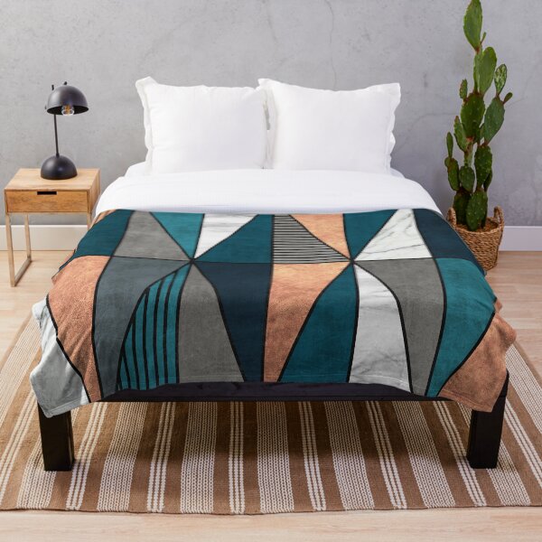 Copper, Marble and Concrete Triangles with Blue Throw Blanket