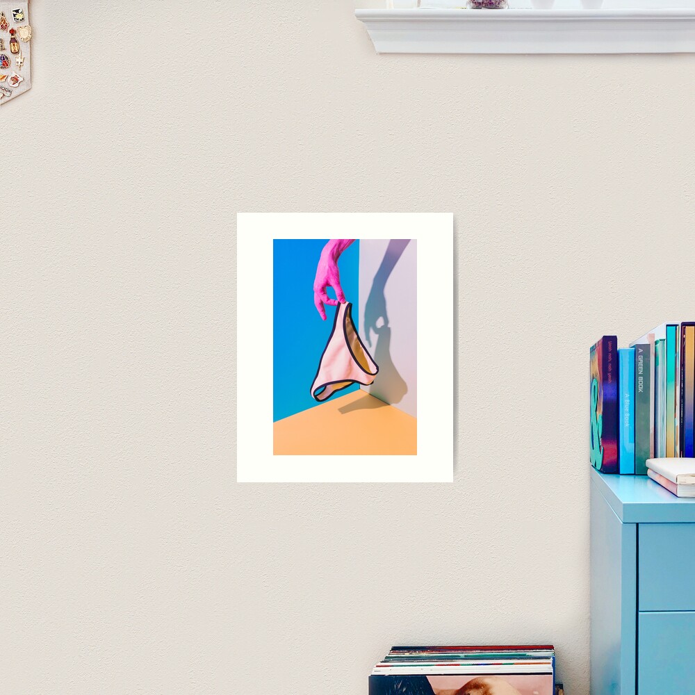 Hand holds the bikini Art Print