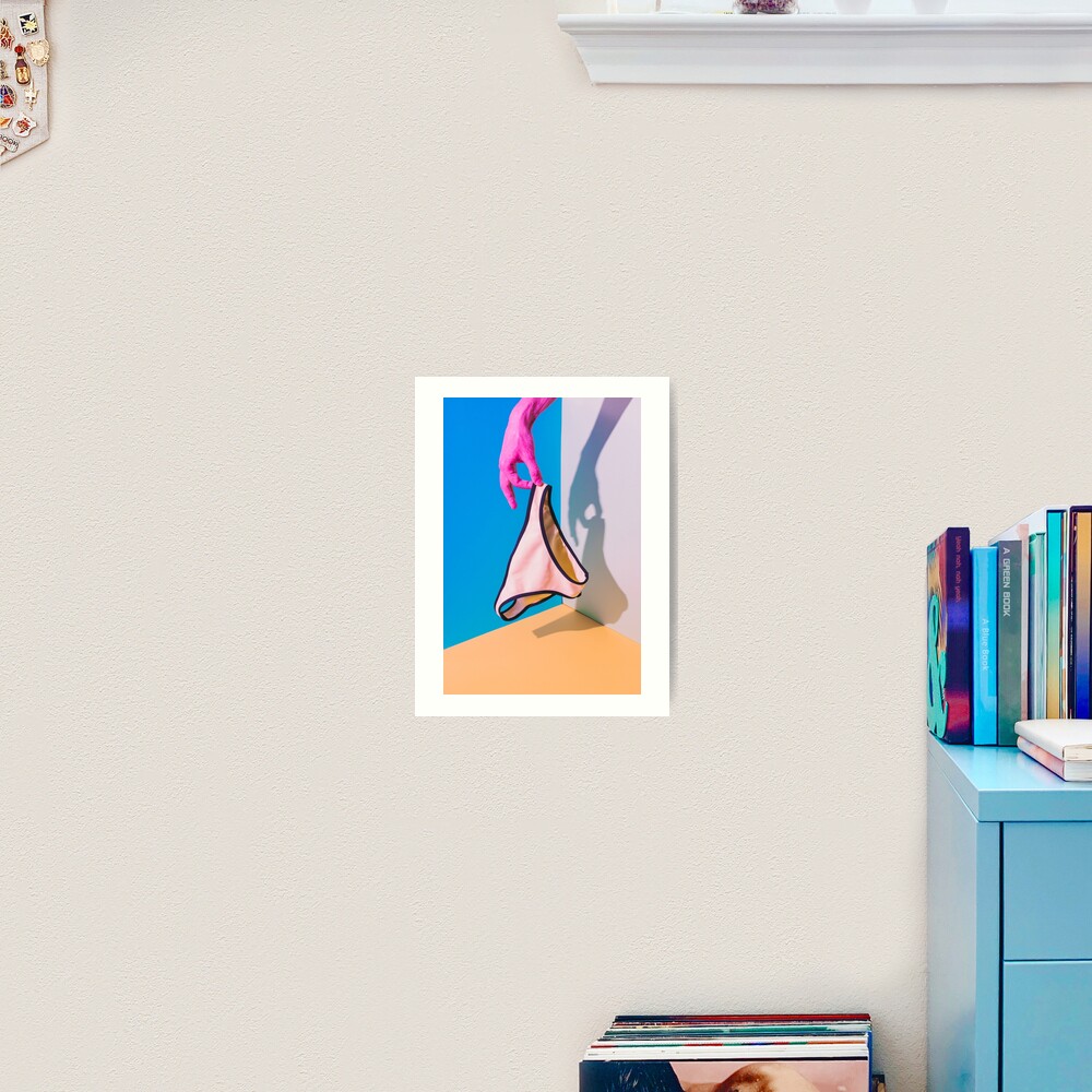 Hand holds the bikini Art Print