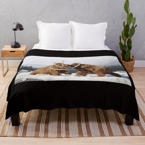 Item preview, woolly mammoth bulls fighting, prehistoric ice age mammals in snow covered landscape designed and sold by DottedYeti.