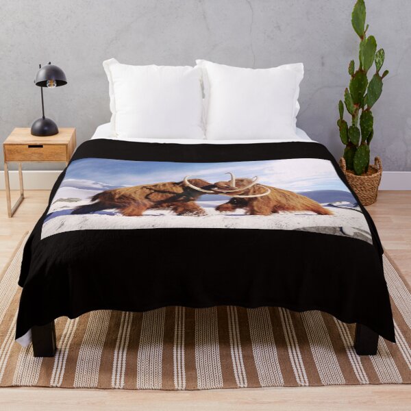 Item preview, woolly mammoth bulls fighting, prehistoric ice age mammals in snow covered landscape designed and sold by DottedYeti.