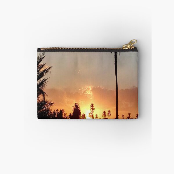 Item preview, A beautiful red sunset with palm and red sky designed and sold by faridman.