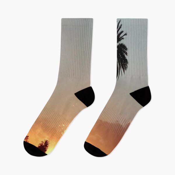 Item preview, A beautiful red sunset with palm and red sky designed and sold by faridman.