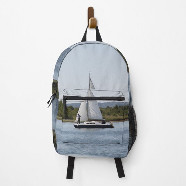 Item preview, Sailing boat sailing on the calm waters of a lake. designed and sold by EstelleRossetti.