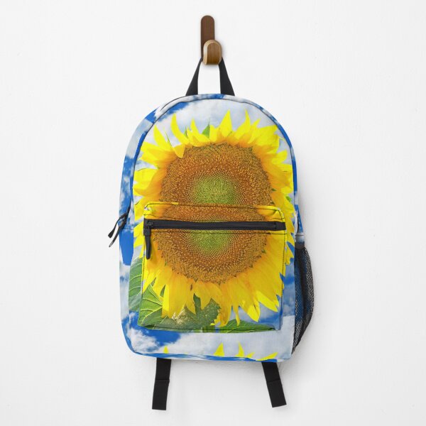 Item preview, Sunflower against of blue sky and white clouds. designed and sold by IaroslavB.