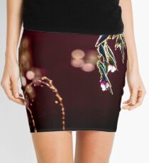 water plant with blossom, bokeh Mini Skirt