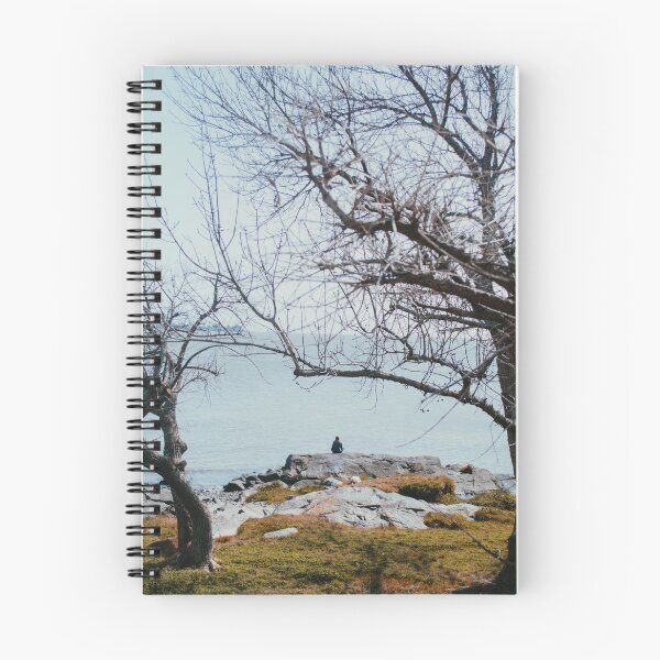 Item preview,  Uruguay: un hombre solitario sentado sobre rocas en una vista pacífica y tranquila sobre el Río de La Plata en el sitio histórico de Colonia del Sacramento. designed and sold by Carmen Jost.