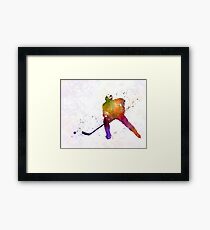 Hockey skater in watercolor Framed Print
