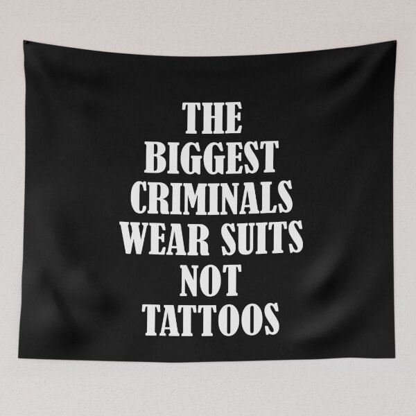 Item preview, The Biggest Criminals Wear Suits Not Tattoos designed and sold by Merch By ika.