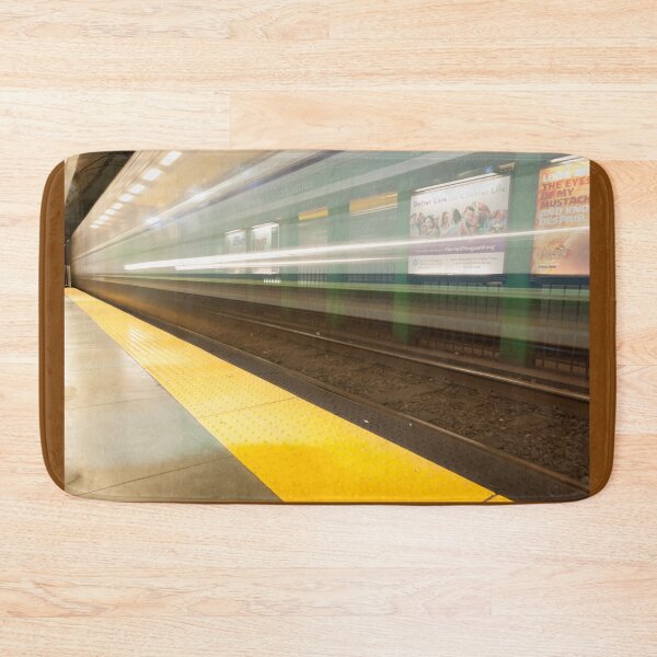 Item preview, Platform with yellow line railway tracks blurred in motion blur aws train passes. designed and sold by Brian Scantlebury.