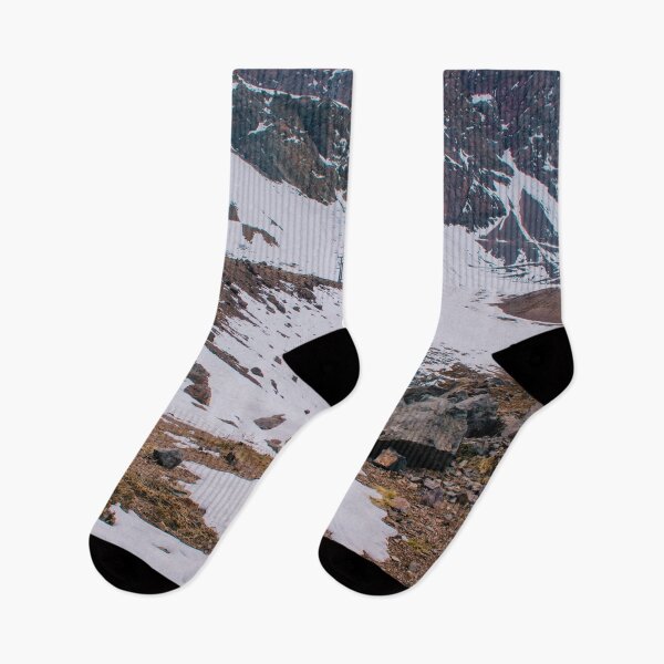 Item preview, A woman hiking towards a landscape of snowy mountains designed and sold by Carmen Jost.