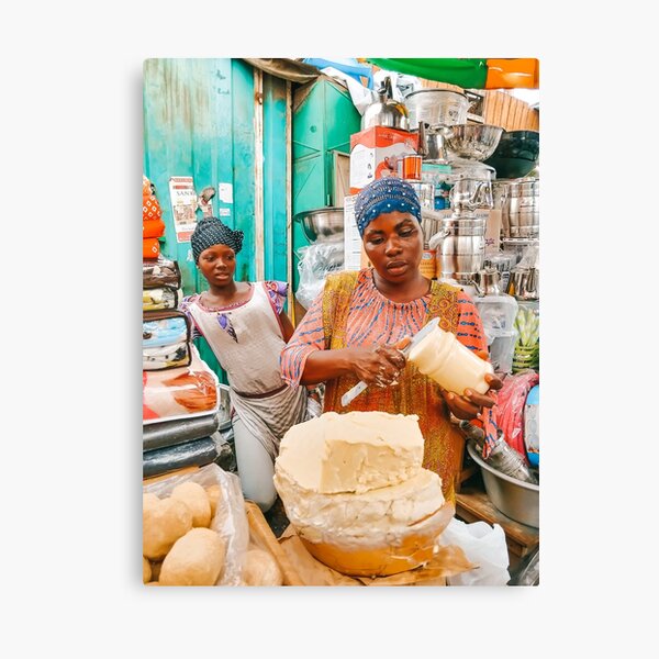 African lady selling Shea Butter on the Market in Accra, Ghana Canvas Print