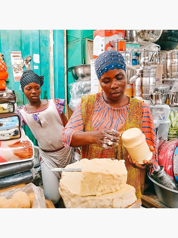 Local African women selling Shea Butter on the Market in Accra