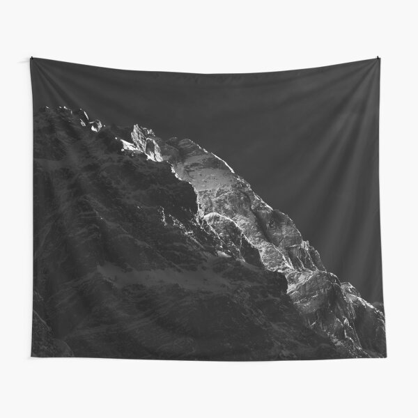 Sun shining on mountains Tapestry