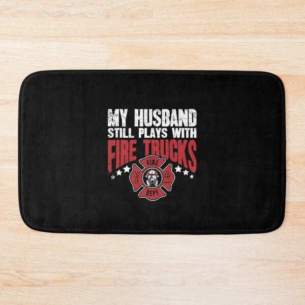 Item preview, Firefighter Wife My Husband Still Plays With Fire Trucks designed and sold by Captain Mood.