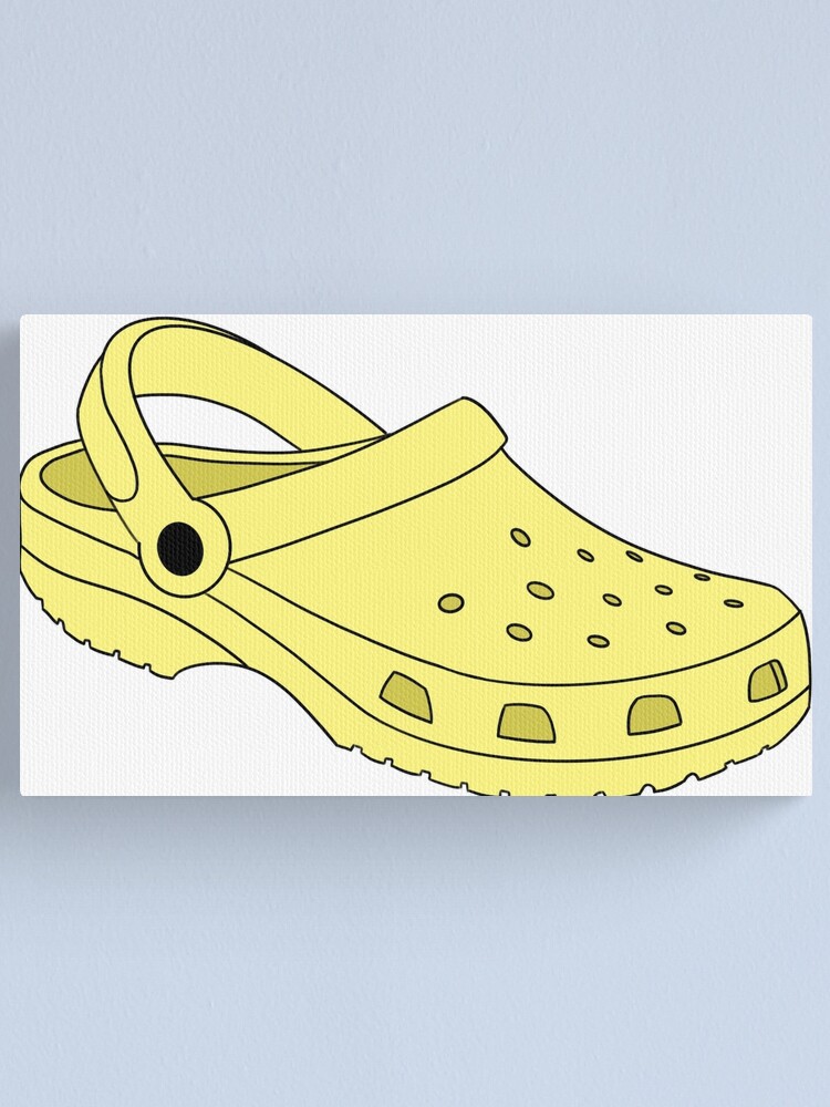 pastel yellow crocs