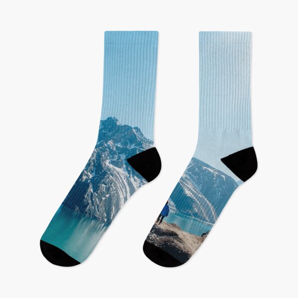 Item preview, A woman in a turquoise landscape of snowy mountains designed and sold by Carmen Jost.