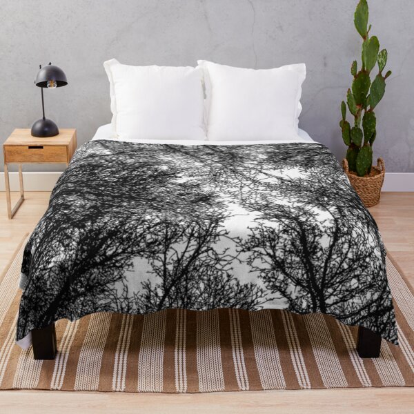 Item preview, Black Trees Silhouette Against White Sky designed and sold by FortuneTee.